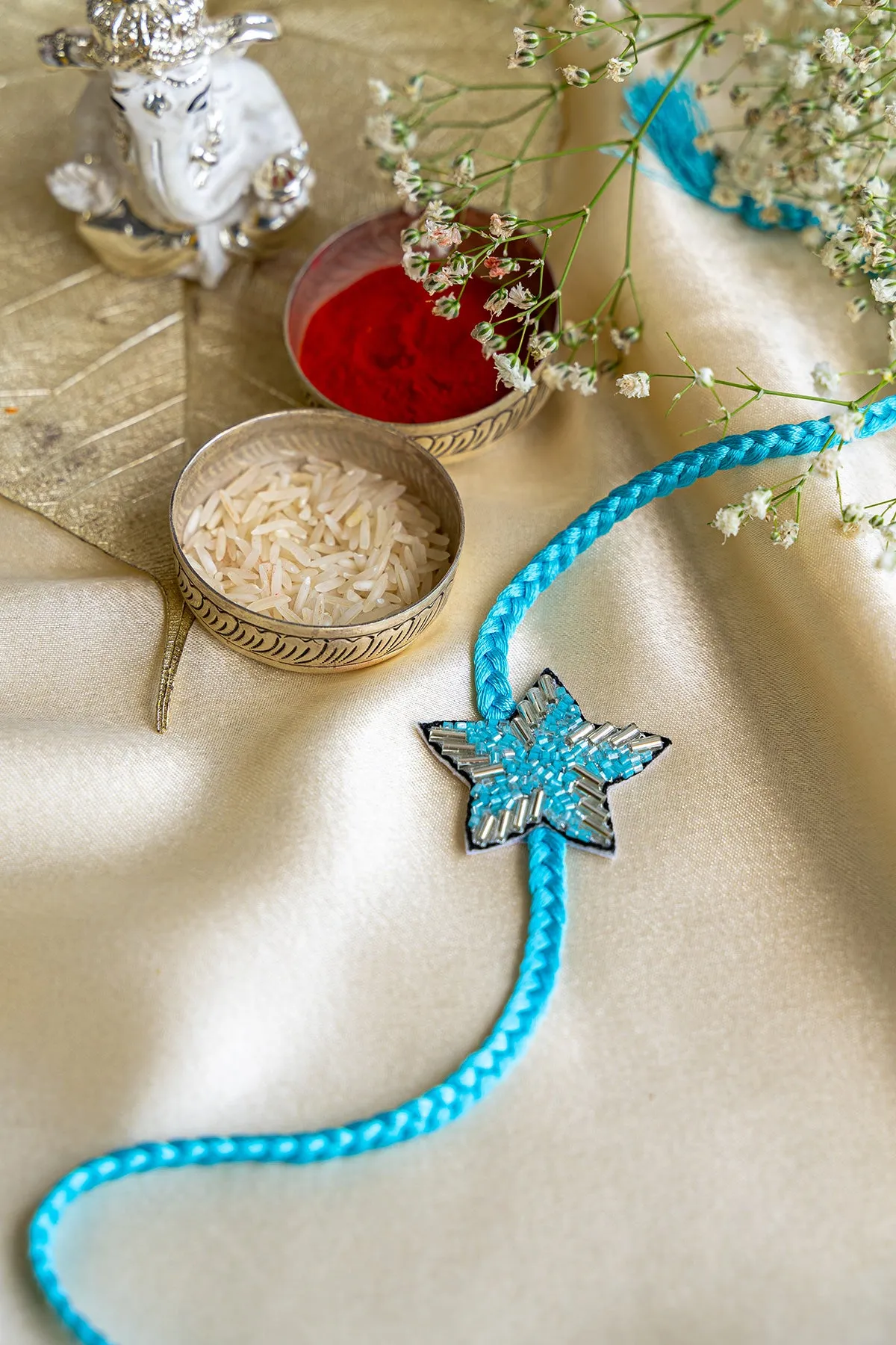 Blue Star Embroidered Rakhi