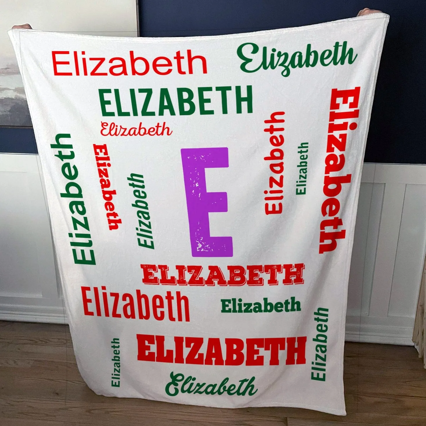 Create your own Cozy Plush Fleece blanket with a name repeating over the entire blanket and Initial