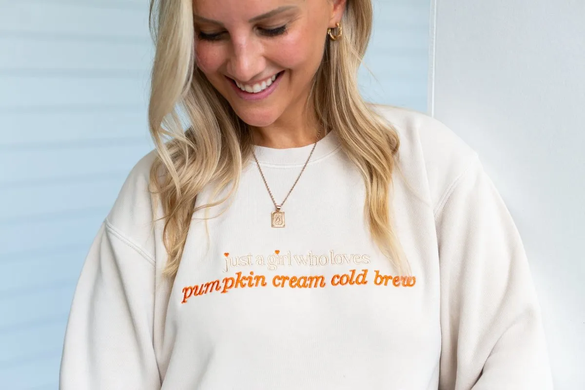 'Just A Girl Who Loves Pumpkin Cream Cold Brew' Cozy Crew