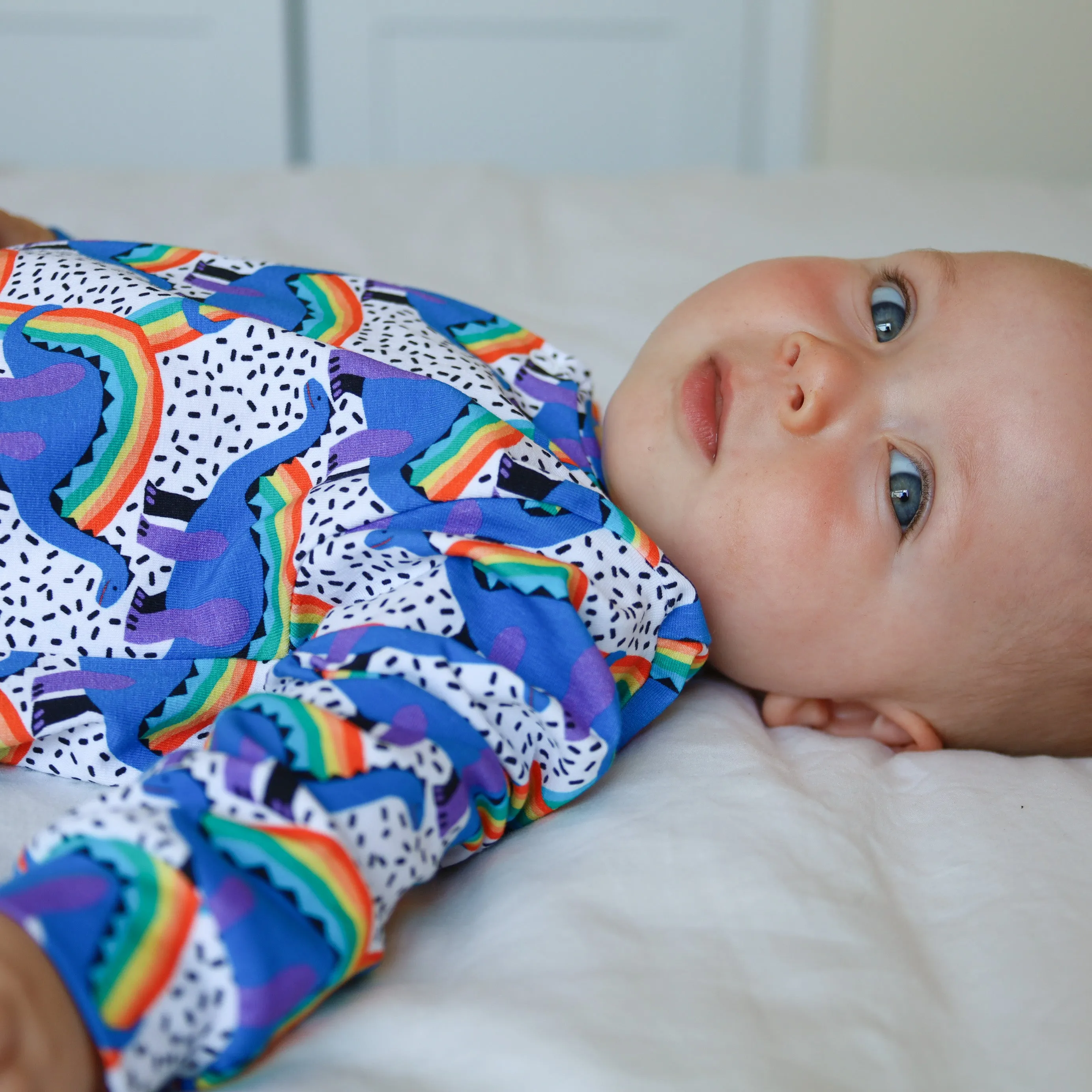 Rainbow Dino cotton sleepsuit