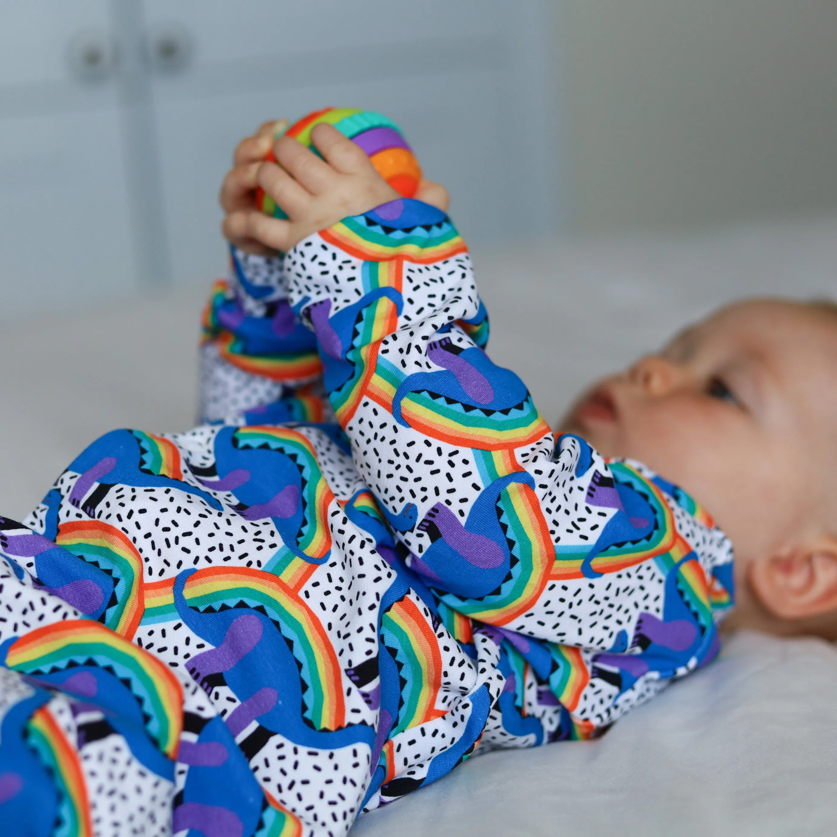 Rainbow Dino cotton sleepsuit