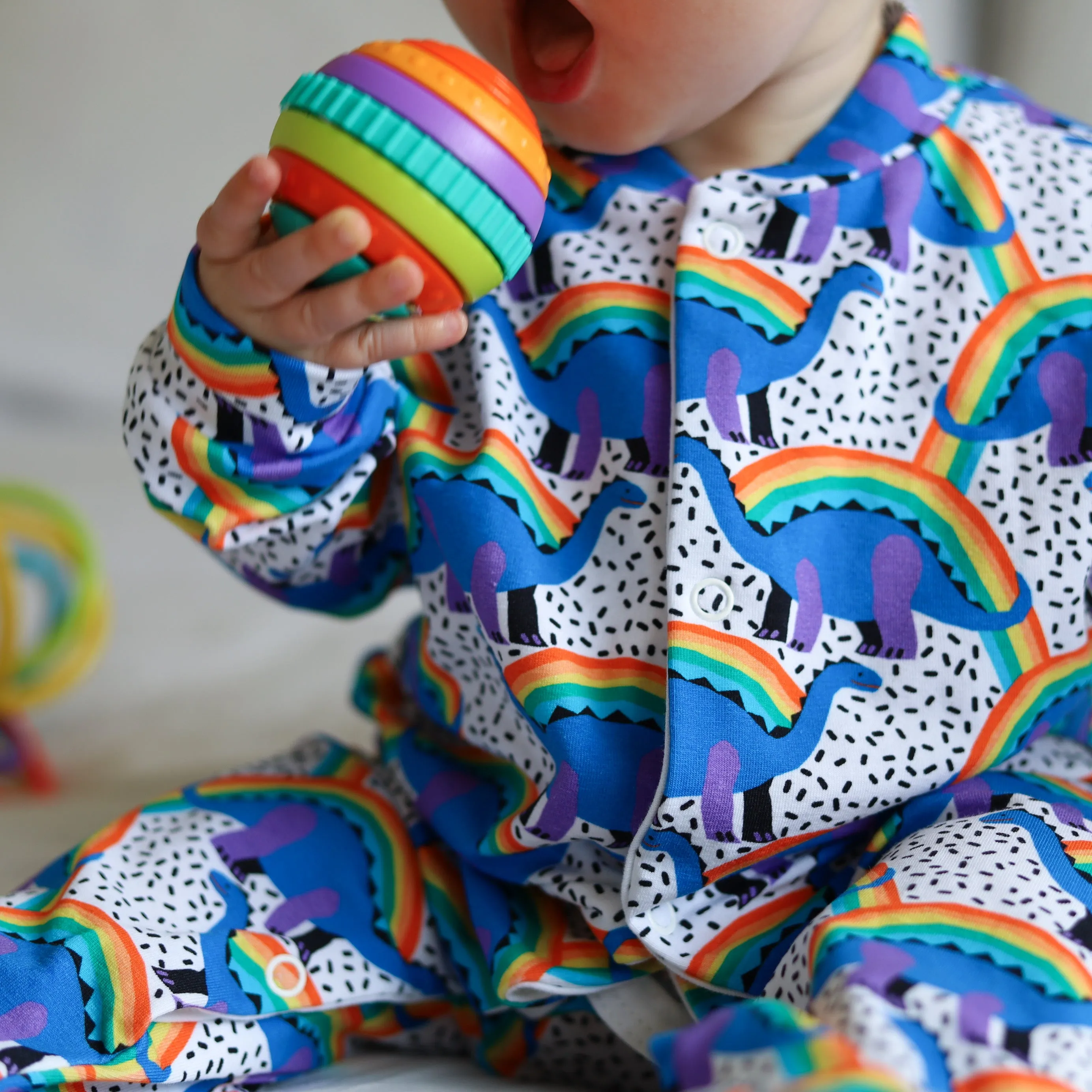 Rainbow Dino cotton sleepsuit